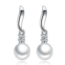 Fringed pearl earrings
