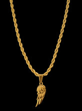 Elegant gold necklace with a wing-shaped pendant on a twisted chain, perfect for adding style to any outfit.